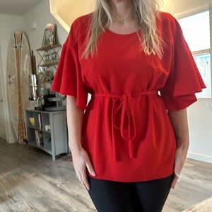 Adorable red top! Never worn!